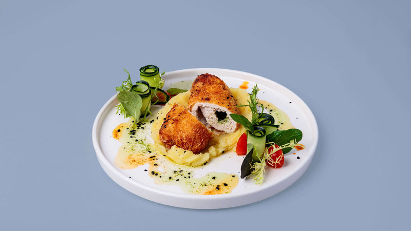 chicken-nuggets-filled-with-cream-ham-served-with-pineapple